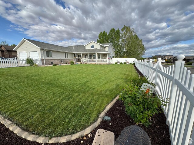 2922 S 500 E, Vernal, UT 84078 - view of front of house with a garage and brick siding