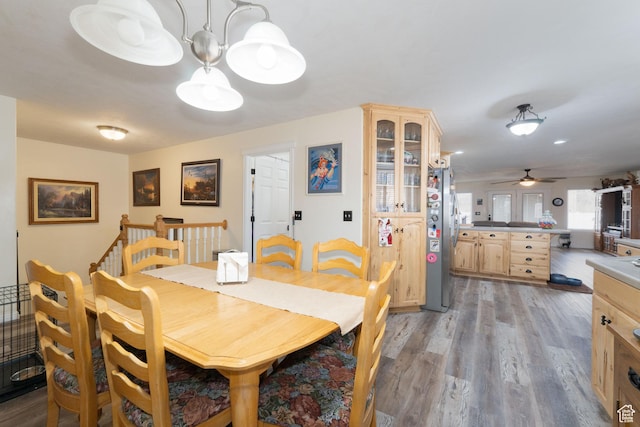 2922 S 500 E, Vernal, UT 84078 - dining room featuring a chandelier, light wood-type flooring, and a ceiling fan