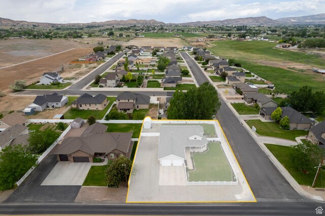 2922 S 500 E, Vernal, UT 84078 - aerial view of property and surrounding area featuring nearby suburban area, property boundaries highlighted, and mountains