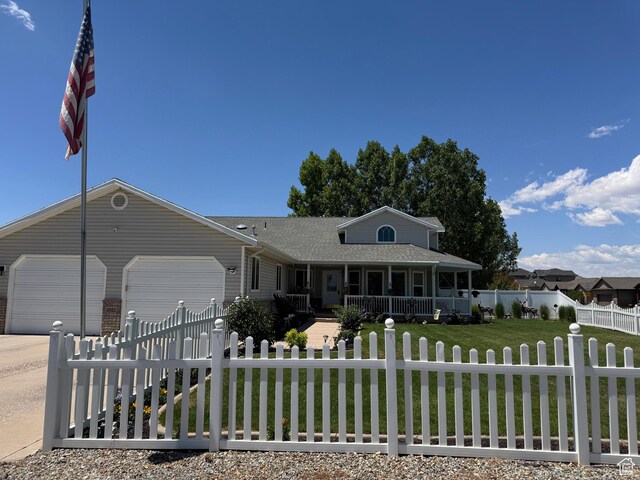 2922 S 500 E, Vernal, UT 84078 - single story home with a porch, a garage, concrete driveway, and roof with shingles