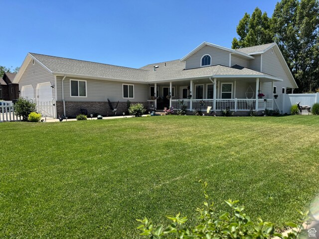 2922 S 500 E, Vernal, UT 84078 - back of property featuring an attached garage, roof with shingles, and a porch