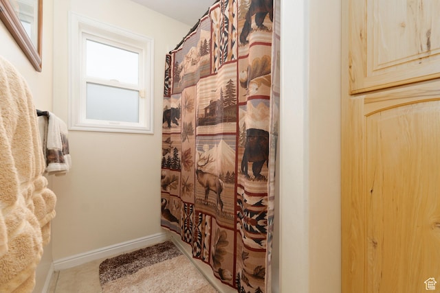 2922 S 500 E, Vernal, UT 84078 - bathroom featuring a shower with curtain and baseboards