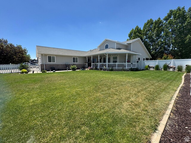 2922 S 500 E, Vernal, UT 84078 - back of house featuring covered porch and brick siding