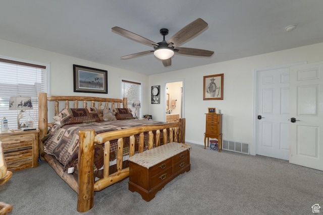 2922 S 500 E, Vernal, UT 84078 - carpeted bedroom with ceiling fan, ensuite bathroom, and baseboards