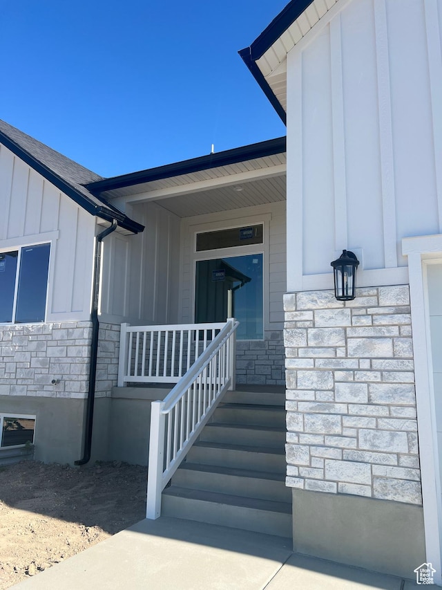4652 W 25 N Unit 415, West Point, UT 84015 - view of exterior entry with stone siding and board and batten siding
