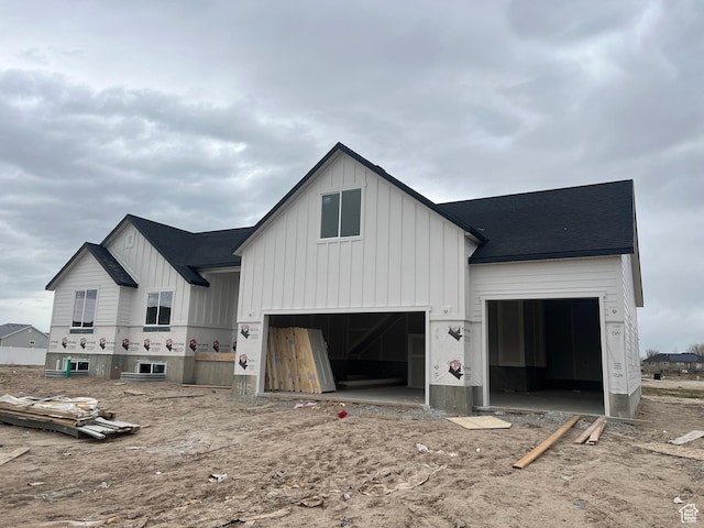 view of front of home featuring a garage and board and batten siding