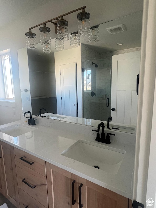 4652 W 25 N Unit 415, West Point, UT 84015 - full bathroom with double vanity and a stall shower