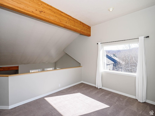8004 Mustang Loop Rd, Park City, UT 84098 - additional living space featuring vaulted ceiling with beams, baseboards, and carpet floors