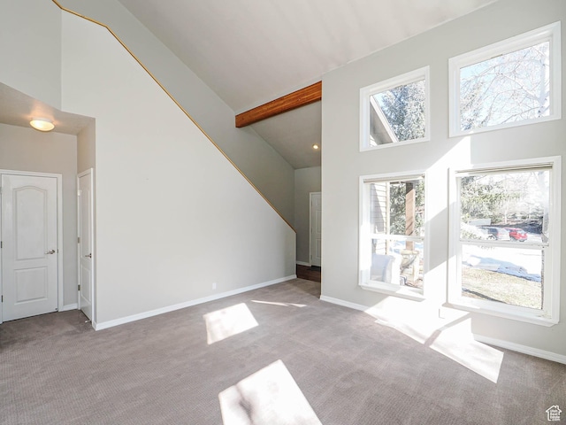 8004 Mustang Loop Rd, Park City, UT 84098 - carpeted living area with beamed ceiling, high vaulted ceiling, and baseboards