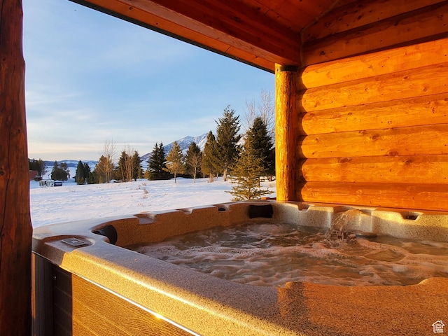 5085 Trumpeter, Island Park, ID 83429 - exterior space with a mountain view and a hot tub