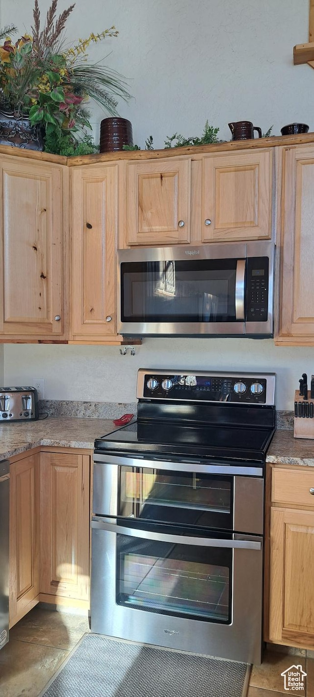 5085 Trumpeter, Island Park, ID 83429 - kitchen with light brown cabinets and appliances with stainless steel finishes