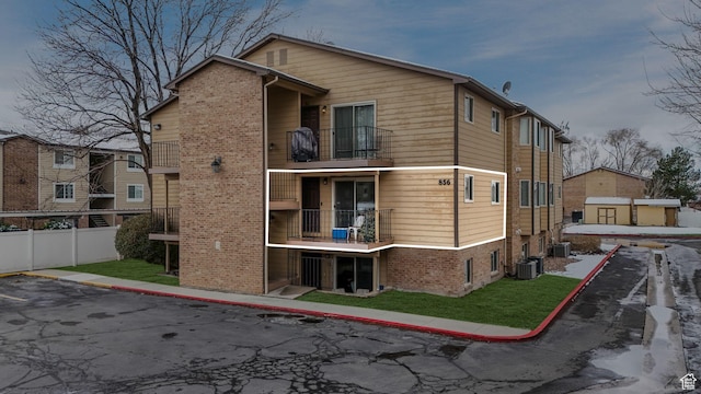 856 E Cedar Pine Ct Unit 21, Salt Lake City, UT 84106 - view of property featuring cooling unit and fence