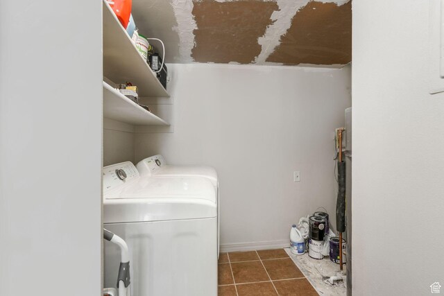 856 E Cedar Pine Ct Unit 21, Salt Lake City, UT 84106 - laundry area with tile patterned floors, laundry area, and washer and clothes dryer