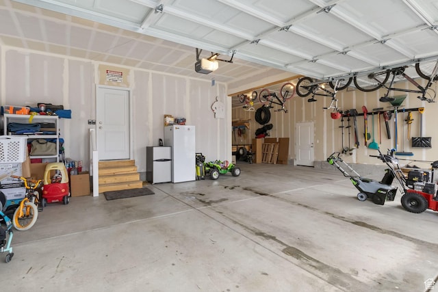 7382 W Butter Hollow Cir, Herriman, UT 84096 - garage featuring a garage door opener