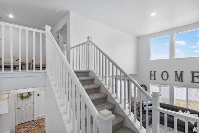 7382 W Butter Hollow Cir, Herriman, UT 84096 - stairway featuring recessed lighting and wood finished floors