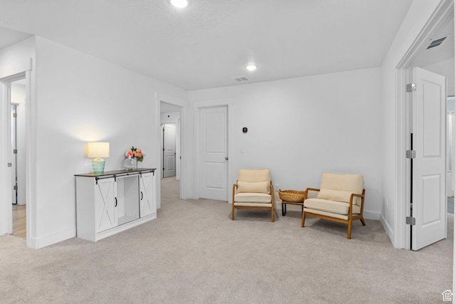 7382 W Butter Hollow Cir, Herriman, UT 84096 - sitting room featuring light carpet, baseboards, and recessed lighting