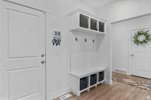 7382 W Butter Hollow Cir, Herriman, UT 84096 - mudroom with light wood-type flooring and baseboards