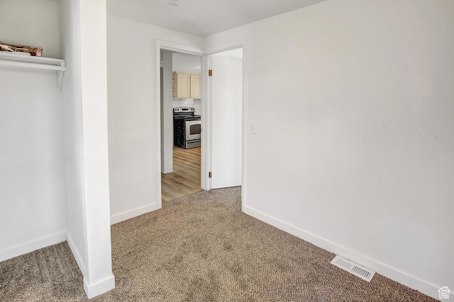 1278 E 22nd St S, Ogden, UT 84401 - interior space with visible vents, light carpet, and baseboards