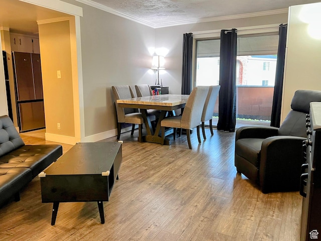208 W Garden Park, Orem, UT 84057 - dining space featuring light wood-style floors, ornamental molding, and baseboards