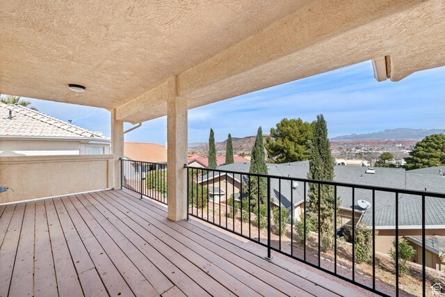 wooden terrace with a mountain view
