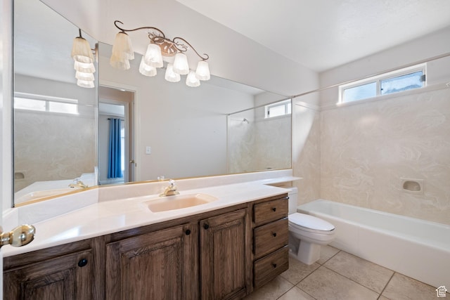 bathroom with tile patterned flooring, toilet, vanity, and  shower combination