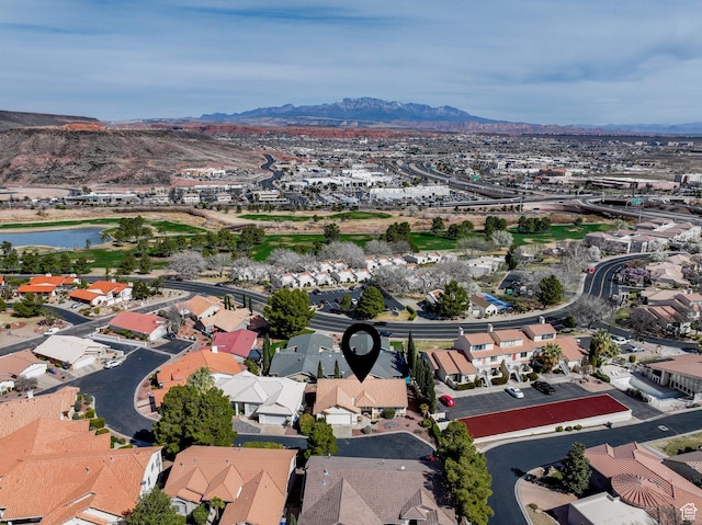 aerial view featuring a residential view and a water and mountain view