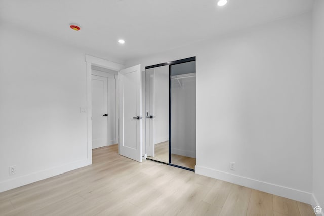 2605 E Portsmouth Ave S, Cottonwood Heights, UT 84121 - unfurnished bedroom with baseboards and wood finished floors