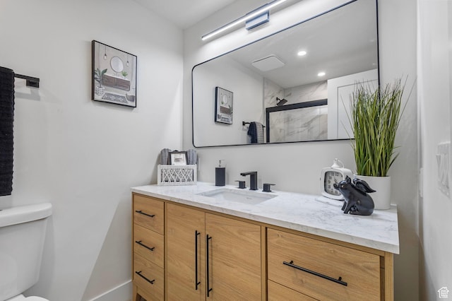 2605 E Portsmouth Ave S, Cottonwood Heights, UT 84121 - bathroom featuring recessed lighting, toilet, a stall shower, and vanity