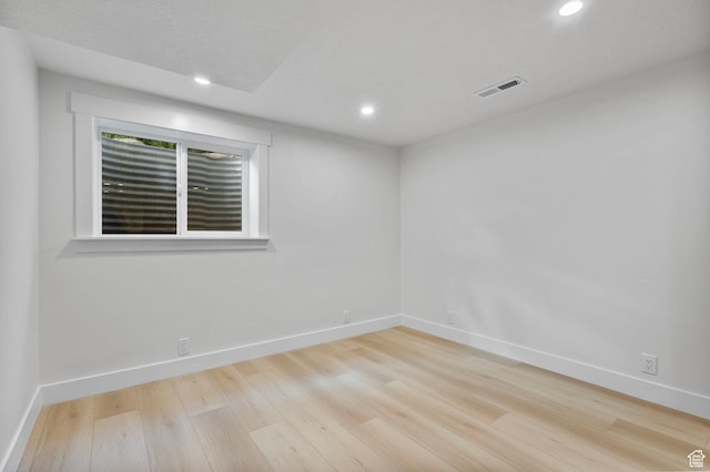 2605 E Portsmouth Ave S, Cottonwood Heights, UT 84121 - spare room featuring visible vents, baseboards, and wood finished floors