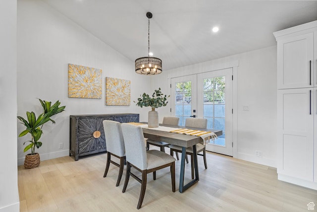 2605 E Portsmouth Ave S, Cottonwood Heights, UT 84121 - dining room featuring lofted ceiling, baseboards, light wood-style floors, and an inviting chandelier