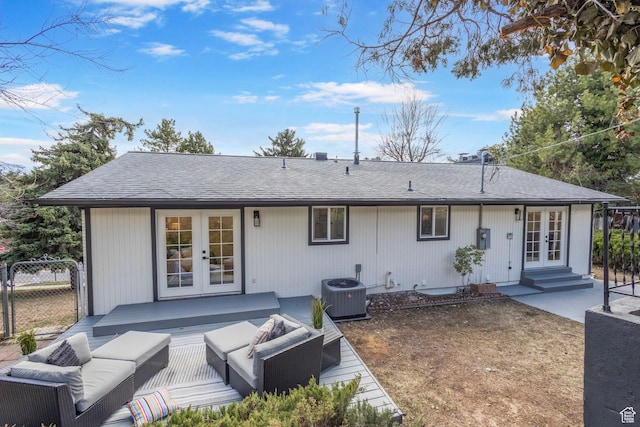 2605 E Portsmouth Ave S, Cottonwood Heights, UT 84121 - back of house featuring a shingled roof, fence, central AC, french doors, and an outdoor hangout area
