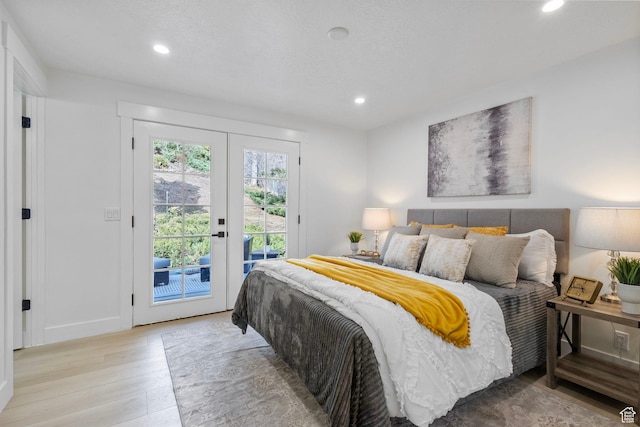 2605 E Portsmouth Ave S, Cottonwood Heights, UT 84121 - bedroom with recessed lighting, french doors, wood finished floors, and access to outside