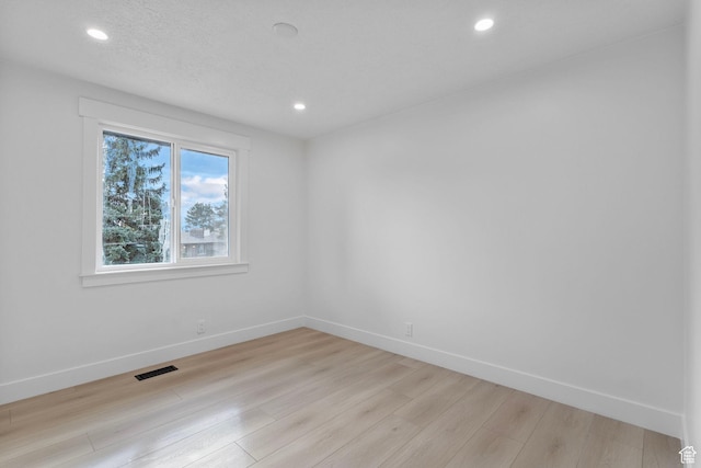 2605 E Portsmouth Ave S, Cottonwood Heights, UT 84121 - spare room with recessed lighting, baseboards, visible vents, and light wood finished floors