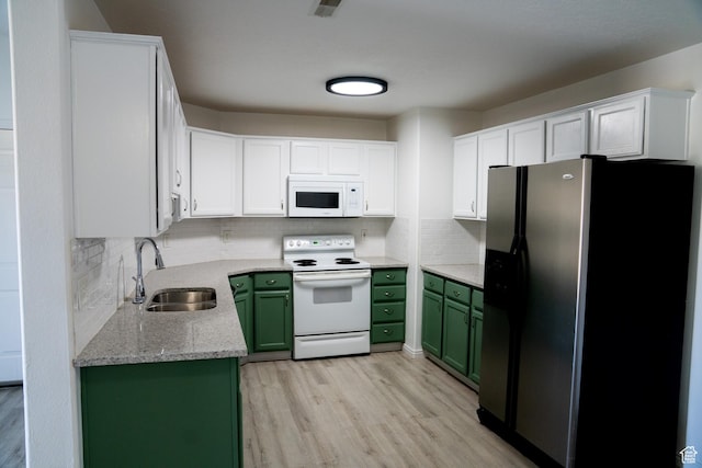 8084 N N Ridge Loop Unit F12, Eagle Mountain, UT 84005 - kitchen with green cabinetry, white appliances, light wood-type flooring, and a sink