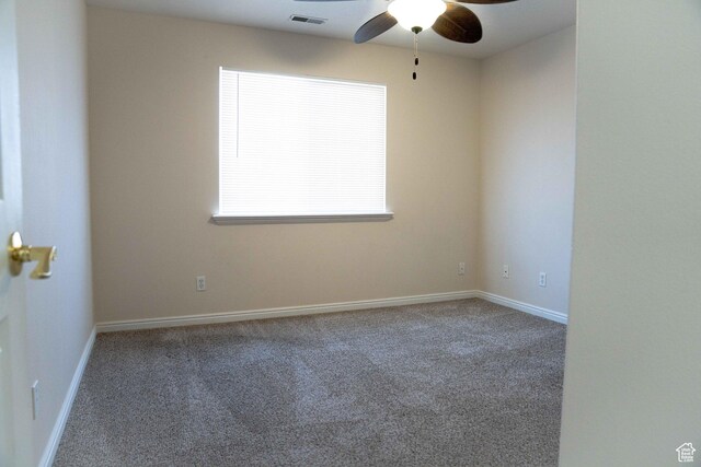 8084 N N Ridge Loop Unit F12, Eagle Mountain, UT 84005 - carpeted spare room featuring visible vents, baseboards, and ceiling fan