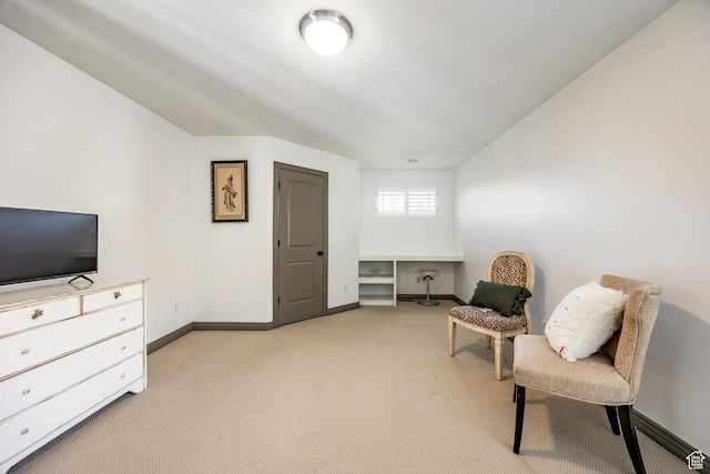 2652 E 6500 S, Uintah, UT 84403 - living area featuring light colored carpet, baseboards, and a desk
