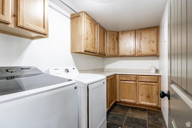 2652 E 6500 S, Uintah, UT 84403 - laundry room featuring washing machine and dryer, stone finish floors, and cabinet space