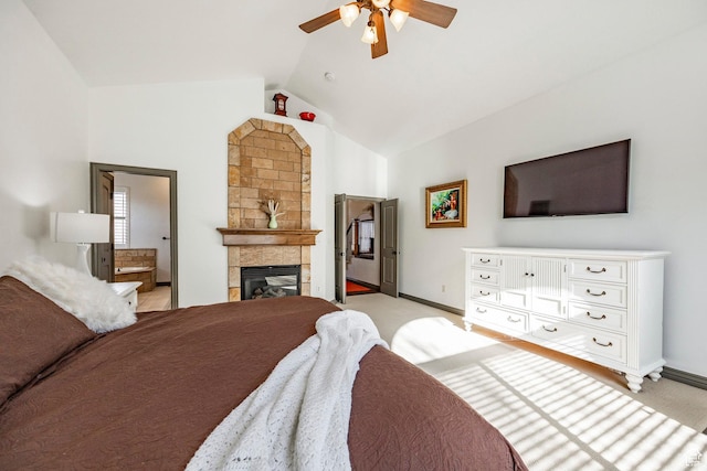 2652 E 6500 S, Uintah, UT 84403 - bedroom featuring vaulted ceiling, a tile fireplace, baseboards, a ceiling fan, and light colored carpet