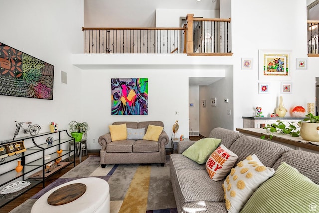 2652 E 6500 S, Uintah, UT 84403 - living area featuring a towering ceiling and baseboards
