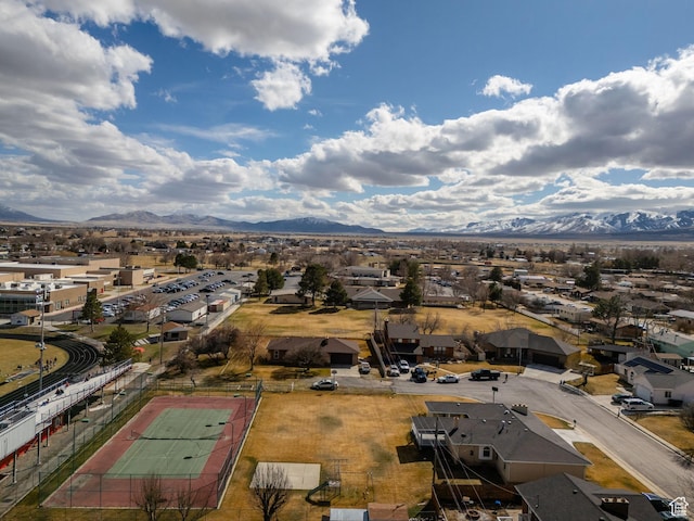 aerial view featuring a mountain view and a residential view