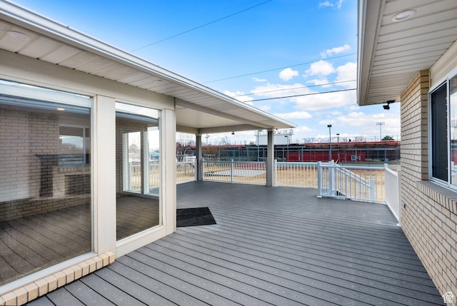 wooden deck featuring fence