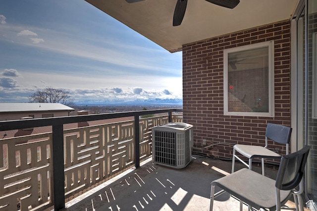 balcony with cooling unit and a ceiling fan