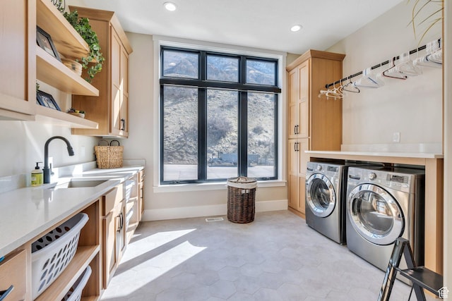 1413 N 1500 E, Provo, UT 84604 - washroom featuring baseboards, cabinet space, recessed lighting, a sink, and washing machine and dryer