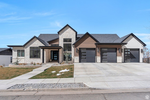 1413 N 1500 E, Provo, UT 84604 - view of front of home featuring a front lawn, an attached garage, stone siding, and driveway