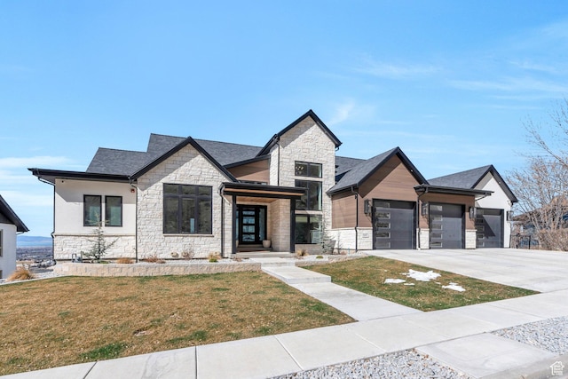 1413 N 1500 E, Provo, UT 84604 - view of front of home featuring a front lawn, an attached garage, stone siding, and driveway
