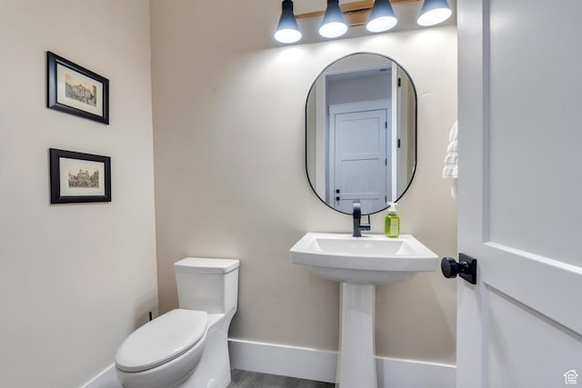 1413 N 1500 E, Provo, UT 84604 - bathroom with toilet, baseboards, and a sink