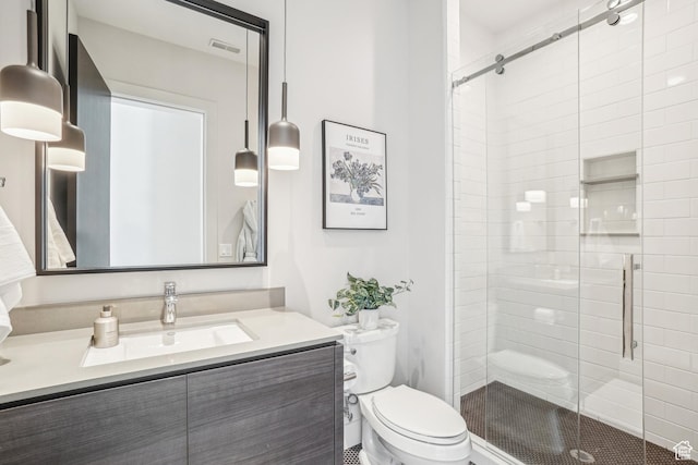 9774 N Red Hawk Trl, Park City, UT 84098 - bathroom featuring visible vents, a shower stall, toilet, and vanity