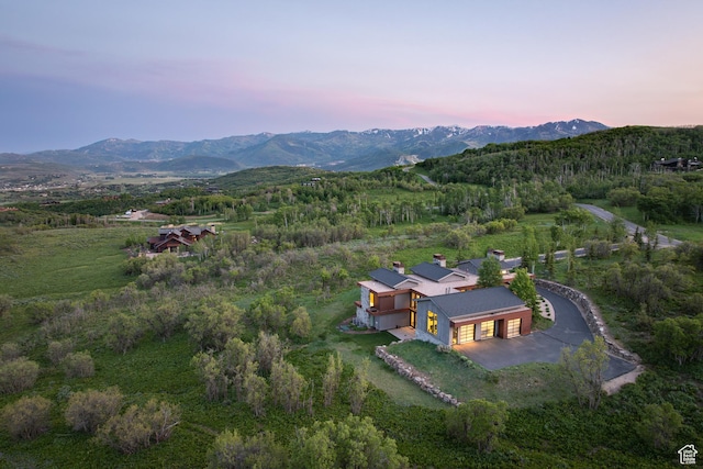 9774 N Red Hawk Trl, Park City, UT 84098 - aerial view at dusk of a mountain view and a view of trees