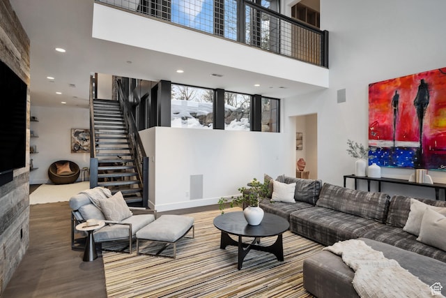 9774 N Red Hawk Trl, Park City, UT 84098 - living area featuring visible vents, stairs, recessed lighting, a high ceiling, and wood finished floors