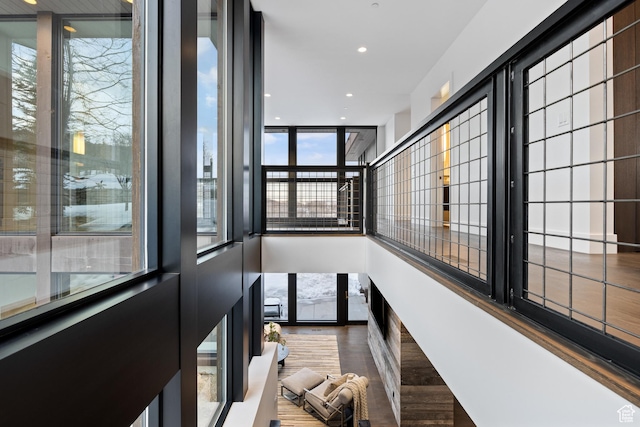 9774 N Red Hawk Trl, Park City, UT 84098 - staircase featuring recessed lighting, a wall of windows, and wood finished floors